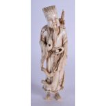 A 19TH CENTURY CHINESE CARVED IVORY FIGURE OF AN IMMORTAL modelled holding an orb. 14 cm high.