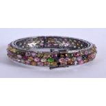 A VINTAGE MULTI STONE DIAMOND BANGLE. 39.1 grams. 6.75 cm diameter.