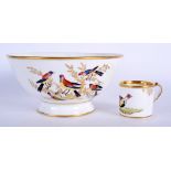 A 19TH CENTURY PARIS PORCELAIN PEDESTAL BOWL painted with birds and a Paris porcelain coffee can si