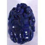 A CHINESE CARVED LAPIS LAZULI BOULDER, in the form of a mythical beast climbing a finger citron. 7