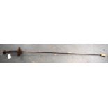 AN ANTIQUE SWORD, formed with a knight head pommel. 105 cm long.