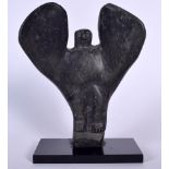 AN UNUSUAL CARVED STONE FIGURE OF A MYTHICAL WINGED FIGURE, mounted upon a rectangular plinth. 23 c