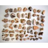 A COLLECTION OF PRE COLUMBIAN INDUS VALLEY POTTERY FRAGMENTS in various forms. (qty)