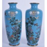 A PAIR OF EARLY 20TH CENTURY JAPANESE MEIJI PERIOD CLOISONNE ENAMEL VASES decorated with birds. 15.