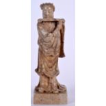A 19TH CENTURY CHINESE CARVED SOAPSTONE FIGURE OF A FEMALE modelled playing a pipe. 24 cm high.