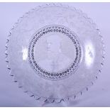 A 19TH CENTURY CHARLES STEWART PARNELL GLASS PLATE, formed with a scalloped rim and a broad band of