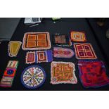 A GROUP OF EASTERN BEADWORK TEXTILES, varying decoration. (11)