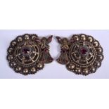 AN ANTIQUE CONTINENTAL SILVER AND GARNET BUCKLE. 12 cm wide.