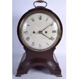 A WILLIAM IV MAHOGANY BALLOON SHAPED MANTEL CLOCK with large circular dial and brass feet. 43 cm hi