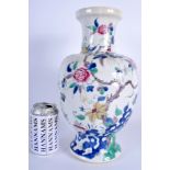 A 19TH CHINESE CANTON FAMILLE ROSE VASE bearing Kangxi marks to base, painted with flowers. 33 cm h