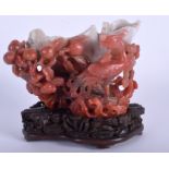 A 19TH CENTURY CHINESE CARVED CARNELIAN AGATE BRUSH WASHER Qing, upon a Zitan base, formed with a b