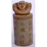 A 20TH CENTURY CHINESE HARDSTONE SEAL, the terminal in the form of a male and body incised with sym