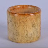 A 19TH CENTURY CHINESE CARVED IVORY ARCHERS RING. 2.75 cm high.