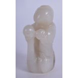 A 19TH CENTURY CHINESE CARVED WHITE GREY JADE FIGURE OF A BOY modelled riding upon a swan. 6.75 cm