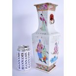 A 19TH CENTURY CHINESE CANTON FAMILLE ROSE VASE painted with warriors and calligraphy. 31 cm high.