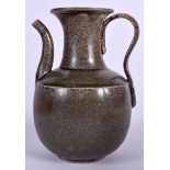 A CHINESE GREEN GLAZED POTTERY EWER, of plain form. 17 cm high.