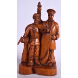 A CHINESE COMMUNIST PERIOD TYPE WOODEN STATUE, formed with two males in military dress. 39.5 cm hig