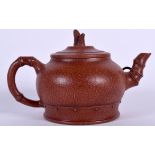 A CHINESE YIXING OR ZISHA POTTERY TEA POT, signed. 15.5 cm wide.