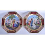 A LARGE PAIR OF EARLY 20TH CENTURY VIENNA PORCELAIN DISHES painted with classical scenes. 34 cm wid