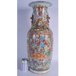 A VERY LARGE 19TH CENTURY CHINESE CANTON FAMILLE ROSE TWIN HANDLED VASE Qing, painted with figures.