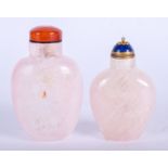 TWO CHINESE CARVED ROSE QUARTZ SNUFF BOTTLES. 7.5 cm & 7 cm high. (2)