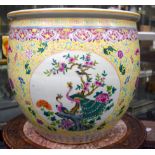 A 19TH CENTURY CHINESE FAMILLE JAUNE STRAITS PORCELAIN JARDINIERE Guangxu, painted with birds besid