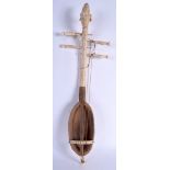 A RARE EARLY 20TH CENTURY AFRICAN TRIBAL IVORY AND WOOD INSTRUMENT formed with a figural terminal.