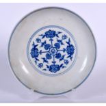 A CHINESE BLUE AND WHITE PORCELAIN DISH BEARING YONGZHENG MARKS. painted with stylised foliage. 17