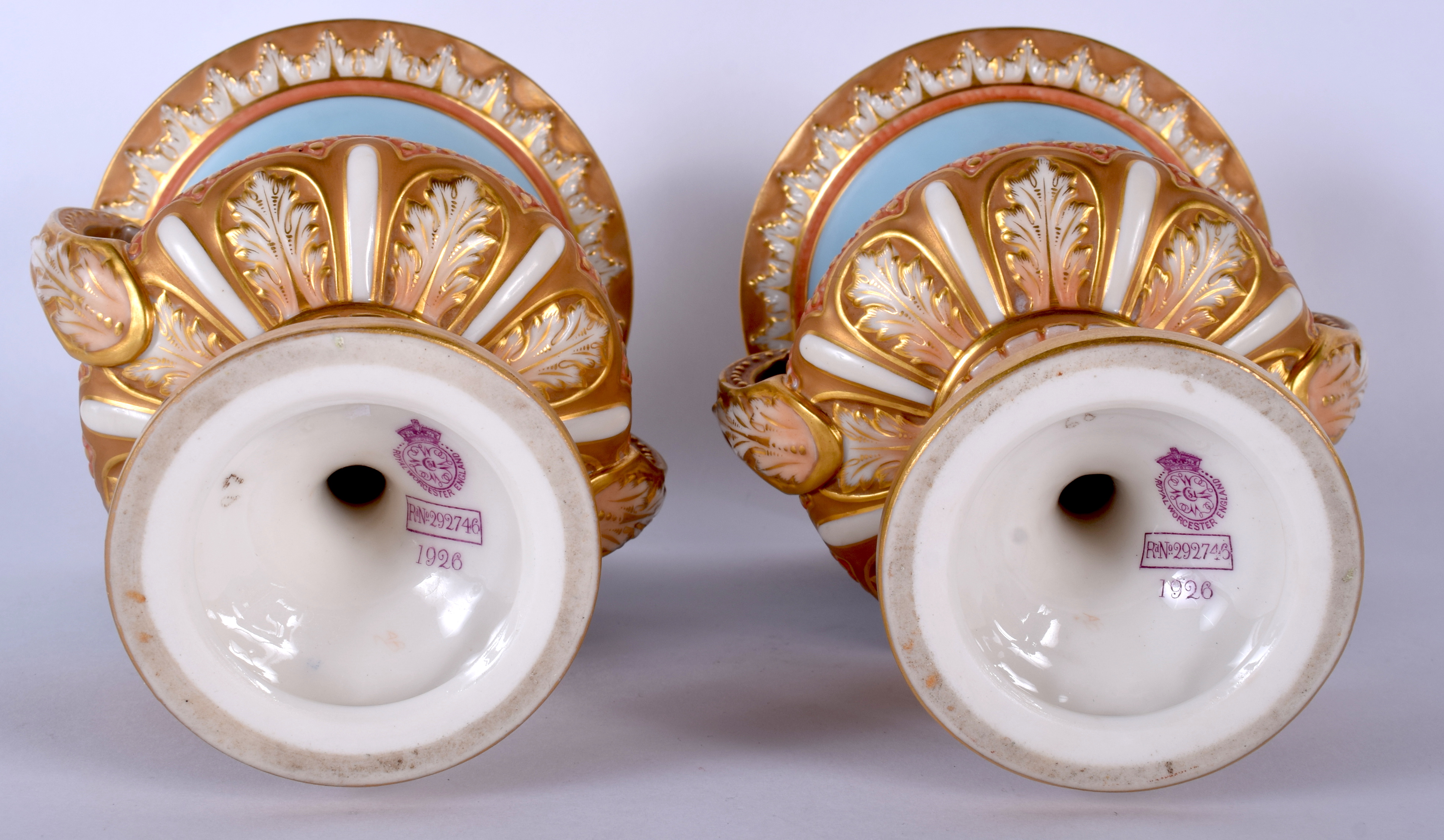 A PAIR OF ROYAL WORCESTER TWIN HANDLED PORCELAIN URN VASES by Charles Baldwyn, painted with swans. - Image 3 of 3