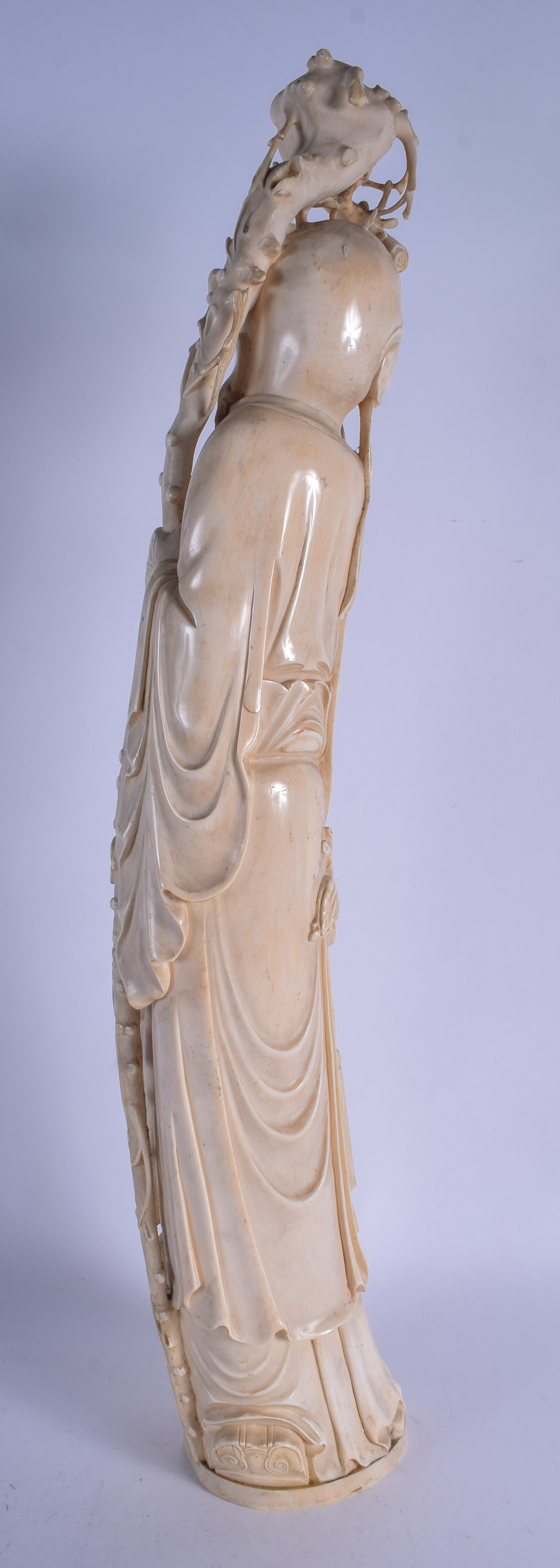 A VERY LARGE 19TH CENTURY CHINESE CARVED IVORY FIGURE OF SAGE Late Qing, modelled standing beside a - Image 5 of 7