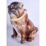 A 19TH CENTURY CONTINENTAL MAJOLICA FIGURE OF A DOG probably Austrian. 22 cm high.