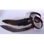 A 19TH CENTURY NEPALESE GURKHA KUKRI, together with belt and scabbard. 44 cm long.