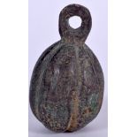 A CHINESE BRONZE WEIGHT IN THE FORM OF A FRUIT, formed with a loop handle. 7 cm long.