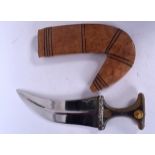 AN EARLY 20TH CENTURY RHINOCEROS HORN HANDLED YEMENI JANBIYA OR JAMBIYA DAGGER, formed with a hide