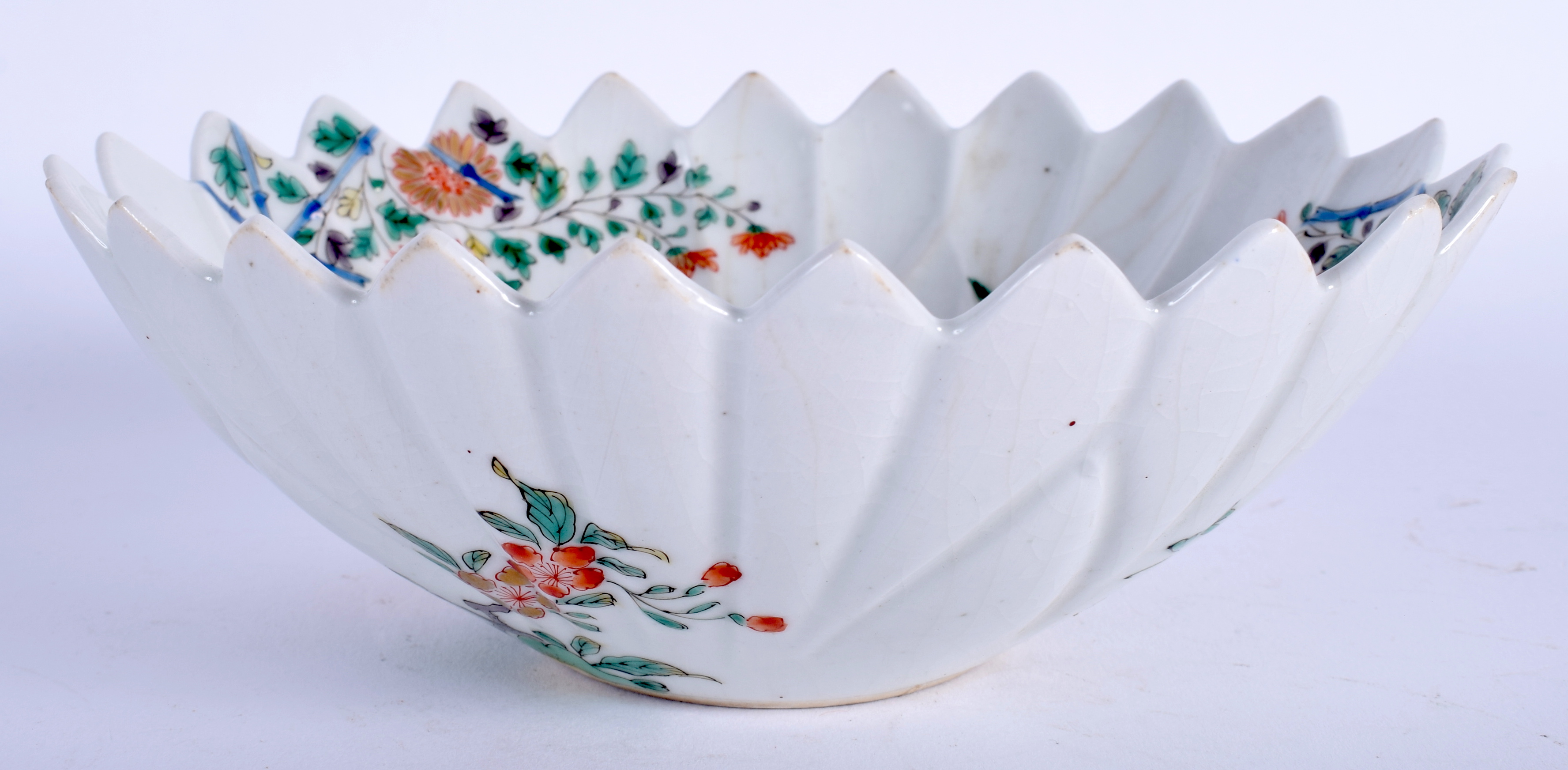 AN 18TH CENTURY JAPANESE EDO PERIOD KAKIEMON BOWL painted with foliage and birds. 16 cm x 12 cm.