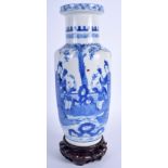 A 19TH CENTURY CHINESE BLUE AND WHITE ROULEAU VASE bearing Kangxi marks to base. Vase 26 cm high.