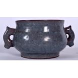 A CHINESE ICE EFFECT CRACKLE GLAZED POTTERY CENSER, formed with twin handles and flared rim. 15.5 c