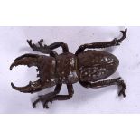 A JAPANESE BRONZE OKIMONO IN THE FORM A STAG BEETLE, signed. 6.5cm wide.