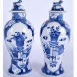 A PAIR OF 19TH CENTURY CHINESE BLUE AND WHITE VASES AND COVERS Qing. 22 cm high.