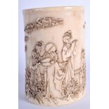 A RARE 19TH CENTURY CHINESE CARVED IVORY BRUSH POT Qing, carved with figures and calligraphy. 460 g