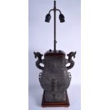 A LARGE EARLY 20TH CENTURY CHINESE TWIN HANDLED BRONZE HU VASE converted to a lamp. Bronze 37 cm x