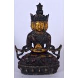 A CHINESE BRONZE BUDDHA, formed with multiple heads upon a beaded lotus base. 12 cm high.