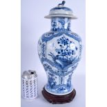 A 19TH CENTURY CHINESE BLUE AND WHITE VASE AND COVER Kangxi style. Vase 36 cm high.