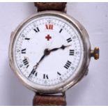 AN ANTIQUE SILVER TRENCH STYLE WRISTWATCH. 3.25 cm diameter.
