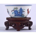 A CHINESE QING DYNASTY DOUCAI PORCELAIN CHICKEN BOWL BEARING CHEGHUA MARKS, painted with fowl and f