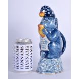 AN UNUSUAL 19TH CENTURY DUTCH DELFT FAIENCE TIN GLAZED JUG in the form of a monkey. 24.5 cm high.