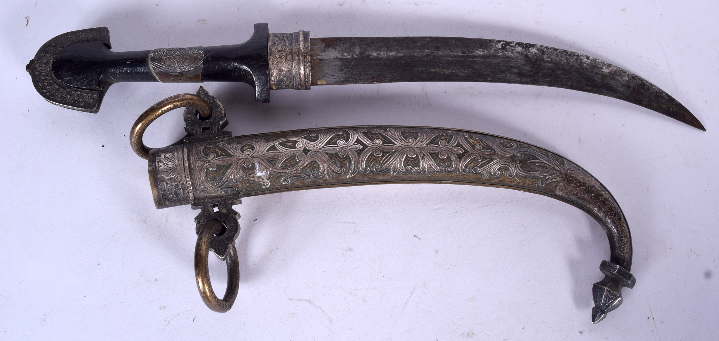 A 19TH CENTURY ISLAMIC KHANJAR CURVED DAGGER, the scabbard inlaid with silver forming foliage. 39 c - Image 3 of 3