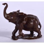 A BRONZE FIGURE OF AN ELEPHANT, formed standing. 5.5 cm wide.