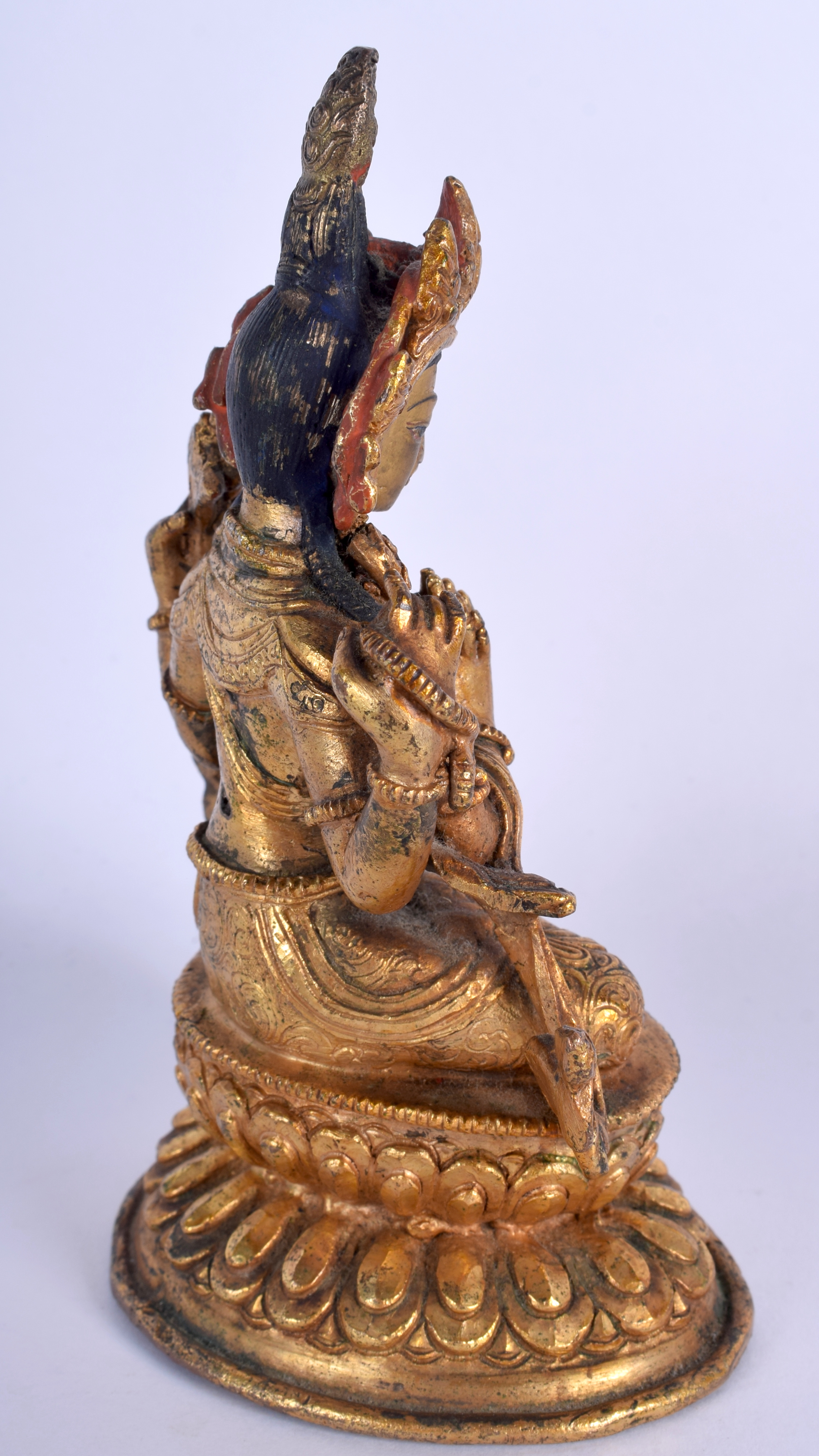AN EARLY 20TH CENTURY CHINESE TIBETAN GILT BRONZE FIGURE OF A BUDDHA modelled with hands clasped up - Image 4 of 5