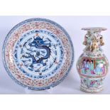 A 19TH CENTURY CHINESE FAMILLE ROSE VASE together with a dragon plate. Vase 20 cm high, dish 18 cm